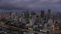6.7K stock footage aerial video of approaching and flying over skyscrapers in Downtown Miami at twilight, Florida Aerial Stock Footage | AX0172_212