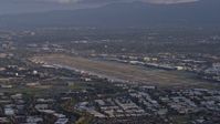 6K stock footage aerial video of San Jose International Airport at sunset, California Aerial Stock Footage | AX0174_0046