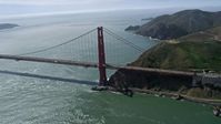6K stock footage aerial video of orbiting one of the towers on the Golden Gate Bridge, San Francisco, California Aerial Stock Footage | AX0175_0164