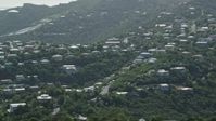 4.8K stock footage aerial video of Hilltop homes among trees, East End, St Thomas  Aerial Stock Footage | AX102_260