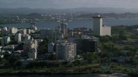 4.8K stock footage aerial video of Apartment buildings along Caribbean blue waters, San Juan, Puerto Rico Aerial Stock Footage | AX103_152