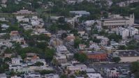 4.8K stock footage aerial video of Residential apartments and businesses, San Juan, Puerto Rico, sunset Aerial Stock Footage | AX104_067