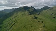 5.5K stock footage aerial video approach a green mountain, The Cobbler, Scottish Highlands, Scotland Aerial Stock Footage | AX110_070