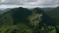 5.5K stock footage aerial video of The Cobbler, a green mountain peak, Scottish Highlands, Scotland Aerial Stock Footage | AX110_073