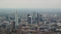 5.5K stock footage aerial video approach The Shard Central and skyscrapers in Central London, England Aerial Stock Footage | AX114_019