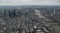 5.5K stock footage aerial video of Central London skyscrapers and Tower Bridge near The Shard, England Aerial Stock Footage | AX114_041
