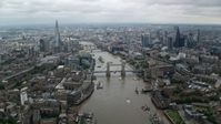5.5K stock footage aerial video of the Shard and Tower Bridge over River Thames, Central London England Aerial Stock Footage | AX114_054