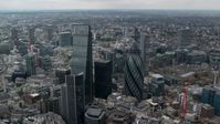 5.5K stock footage aerial video of The Gherkin and Leadenhall Building skyscrapers, Central London, England Aerial Stock Footage | AX114_062
