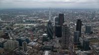 5.5K stock footage aerial video of approaching The Gherkin skyscraper in Central London, England Aerial Stock Footage | AX114_072