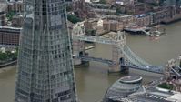 5.5K stock footage aerial video of Tower Bridge over River Thames, seen from The Shard, London, England Aerial Stock Footage | AX114_080