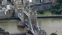 5.5K stock footage aerial video of circling the Tower Bridge, London, England Aerial Stock Footage | AX114_089