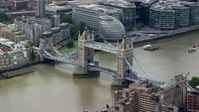 5.5K stock footage aerial video of an orbit around historic Tower Bridge on River Thames, London, England Aerial Stock Footage | AX114_091