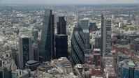 5.5K stock footage aerial video of orbiting The Gherkin and skyscrapers in Central London, England Aerial Stock Footage | AX114_104