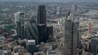 5.5K stock footage aerial video of orbiting The Gherkin and Heron Tower skyscrapers, London, England Aerial Stock Footage | AX114_108