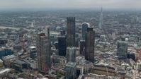 5.5K stock footage aerial video of circling the skyscrapers in Central London, England, The Shard in the background Aerial Stock Footage | AX114_111