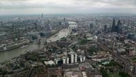 5.5K stock footage aerial video approach The Shard and River Thames bridges in London, England Aerial Stock Footage | AX114_158