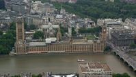 5.5K stock footage aerial video of passing Big Ben and Parliament across the River Thames, London, England Aerial Stock Footage | AX114_180