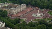 5.5K stock footage aerial video of flying by Buckingham Palace and Victoria Memorial, London, England Aerial Stock Footage | AX114_191