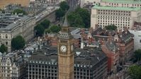 5.5K stock footage aerial video of orbiting the top of Big Ben in London, England Aerial Stock Footage | AX114_226