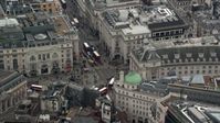 5.5K stock footage aerial video of orbiting Piccadilly Circus, London, England Aerial Stock Footage | AX114_234