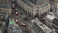 5.5K stock footage aerial video of orbiting Piccadilly Circus and double decker buses, London, England Aerial Stock Footage | AX114_236