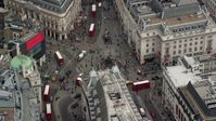 5.5K stock footage aerial video of an orbit of Piccadilly Circus and double decker buses, London, England Aerial Stock Footage | AX114_237
