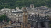 5.5K stock footage aerial video of orbiting Big Ben and Portcullis House, London England Aerial Stock Footage | AX115_107