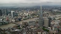 5.5K stock footage aerial video of orbiting The Shard by the River Thames, London, England Aerial Stock Footage | AX115_153