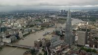 5.5K stock footage aerial video of orbiting The Shard overlooking the River Thames, London, England Aerial Stock Footage | AX115_154