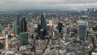 5.5K stock footage aerial video of orbiting a group of skyscrapers in Central London, England Aerial Stock Footage | AX115_156