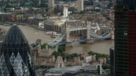 5.5K stock footage aerial video flyby The Gherkin with view of Tower of London and Tower Bridge, England Aerial Stock Footage | AX115_163