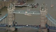 5.5K stock footage aerial video of a close orbit of the Tower Bridge on the River Thames, London, England Aerial Stock Footage | AX115_168