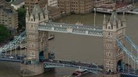 5.5K stock footage aerial video of a close orbit of the Tower Bridge, London, England Aerial Stock Footage | AX115_169