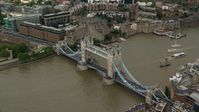5.5K stock footage aerial video of River Thames and the Tower Bridge, London, England Aerial Stock Footage | AX115_171