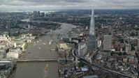 5.5K stock footage aerial video of The Shard, and Tower Bridge over the River Thames, London, England Aerial Stock Footage | AX115_184