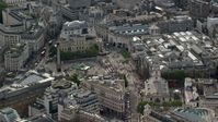 5.5K stock footage aerial video orbiting Trafalgar Square and Canada House, London, England Aerial Stock Footage | AX115_205