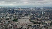 5.5K stock footage aerial video of a wide view of the cityscape, from Central London to Shard by River Thames, England Aerial Stock Footage | AX115_250