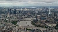 5.5K stock footage aerial video of Central London skyscrapers, the River Thames, The Shard, England Aerial Stock Footage | AX115_251