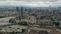 5.5K stock footage aerial video wide view of the Central London cityscape including The Shard and London Eye, England Aerial Stock Footage | AX115_254