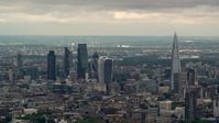 5.5K stock footage aerial video of skyscrapers in Central London near The Shard, England Aerial Stock Footage | AX115_274