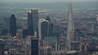 5.5K stock footage aerial video of a view of Central London skyscrapers, The Shard and Strata, England Aerial Stock Footage | AX115_277