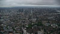 5.5K stock footage aerial video of flying by skyscrapers and Central London cityscape, England, twilight Aerial Stock Footage | AX116_008