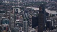 5.5K stock footage aerial video of orbiting Central London skyscrapers, London, England, twilight Aerial Stock Footage | AX116_013