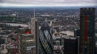 5.5K stock footage aerial video flyby Heron Tower, reveal The Gherkin skyscraper, London, England, twilight Aerial Stock Footage | AX116_018