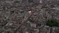 5.5K stock footage aerial video of approaching Piccadilly Circus in London, England, twilight Aerial Stock Footage | AX116_032