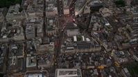 5.5K stock footage aerial video of a bird's eye view of Piccadilly Circus, London, England, twilight Aerial Stock Footage | AX116_037