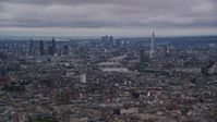 5.5K stock footage aerial video of a view of the River Thames and Central London skyscrapers, England, twilight Aerial Stock Footage | AX116_049