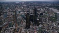 5.5K stock footage aerial video of orbiting skyscrapers in Central London, England, twilight Aerial Stock Footage | AX116_086