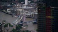 5.5K stock footage aerial video flyby 122 Leadenhall Street to reveal Tower Bridge and River Thames, London, England, twilight Aerial Stock Footage | AX116_088