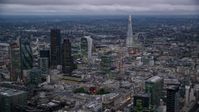 5.5K stock footage aerial video of a view of skyscrapers and cityscape in London, England, twilight Aerial Stock Footage | AX116_093